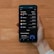 A hand holds a smartphone displaying a cryptocurrency portfolio with various assets including Decentraland, Ethereum, Bitcoin, Algorand, and Polygon. The balance for each asset is shown alongside icons representing each cryptocurrency.